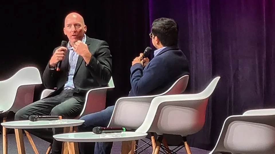 Olivier Gomez in a fire chat on stage at VivaTech 2023, Paris
